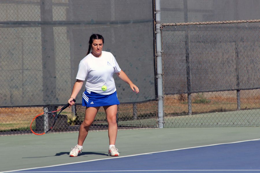 Carina Giancanelli returns the ball.