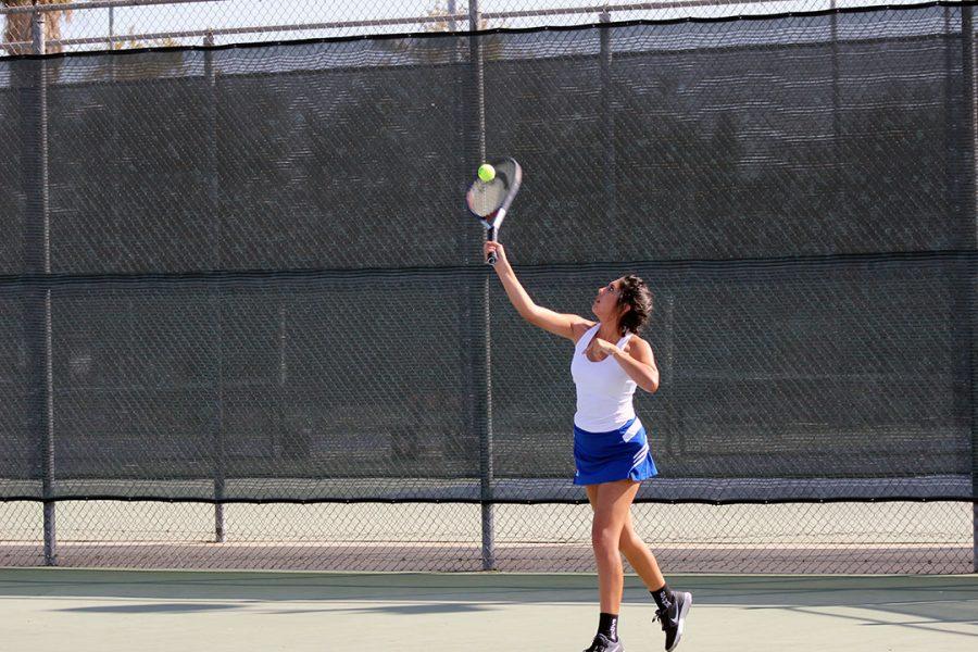 Annaliesse Galaviz serves.