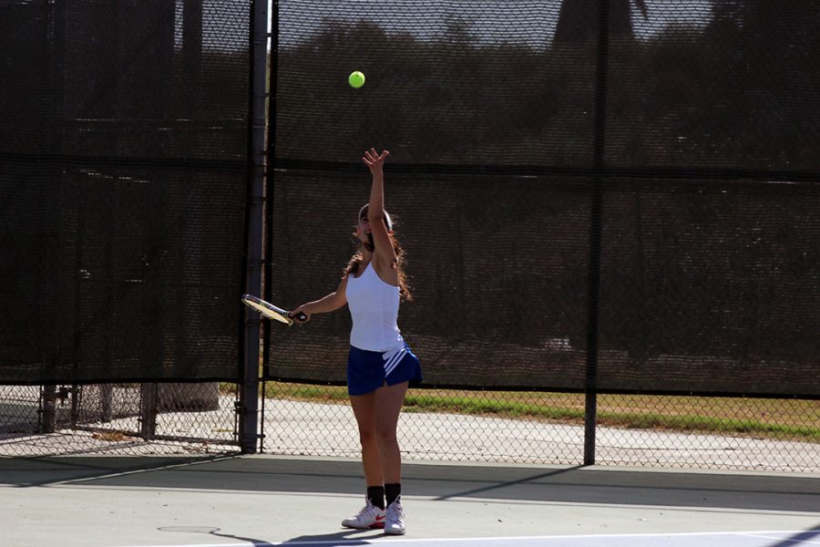 Iliana Herrera prepares to serve.