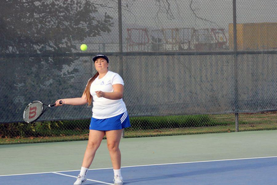 Kristie Jimenez returns the pass.